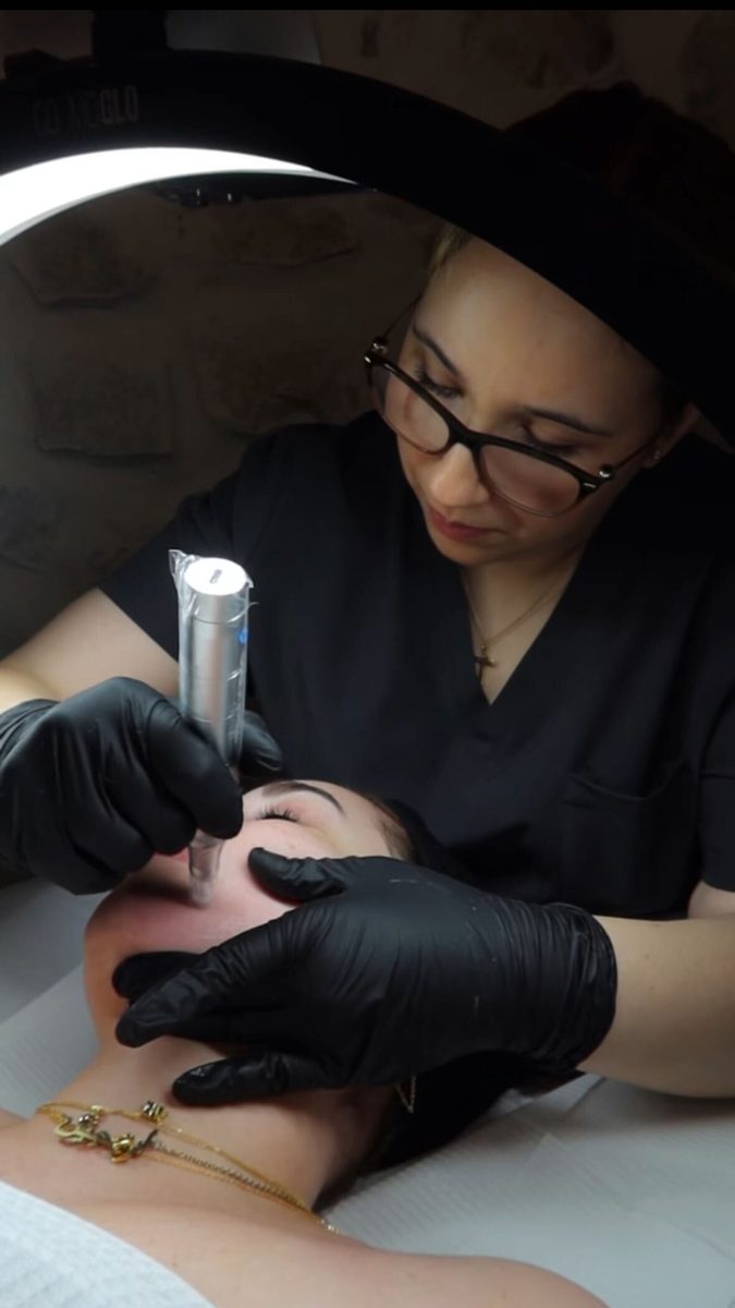 Microneedling treatment at Rituel Med Spa in Phoenix — esthetician performing collagen induction therapy